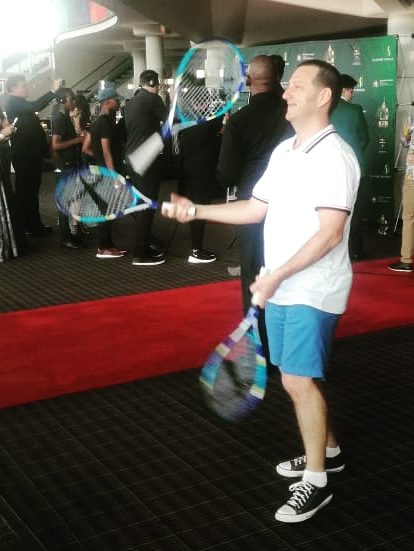 Tom Juggling Tennis Raquets