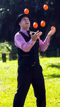 Tom juggling balls